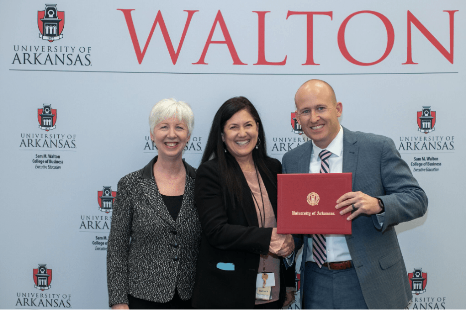 DHS Secretary Cindy Gillespie is pictured here with Tonya Williams, Director of Childcare and Early Childhood Education, and Brent Williams, Associate Dean of Outreach and Executive Education, at the certificate ceremony in September 2019.